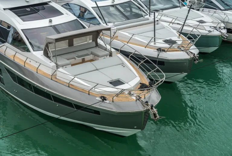 Luxury motor yachts moored in marina